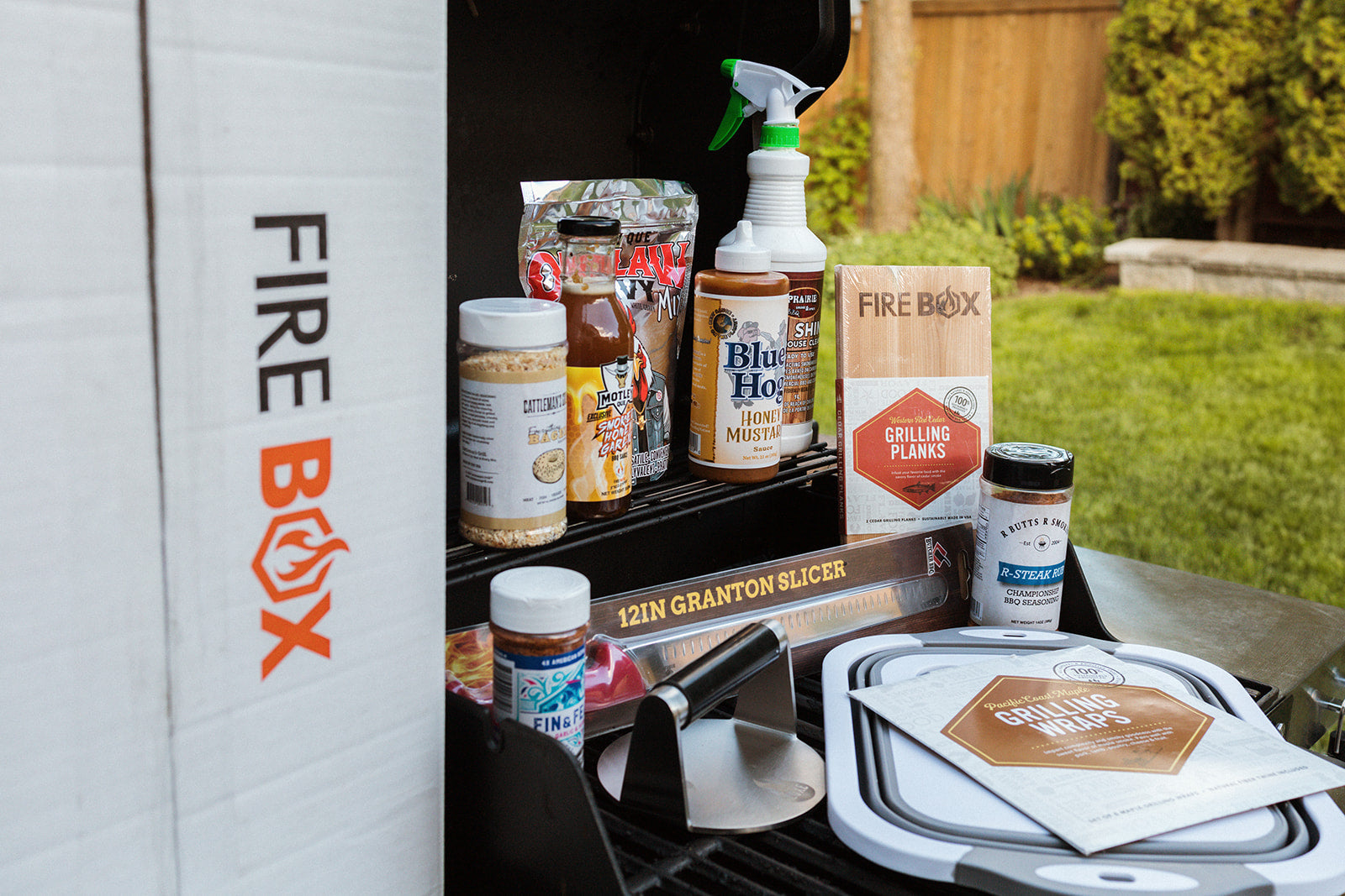 BBQ Subscription Box featuring BBQ Sauces and Spices and grilling accessories